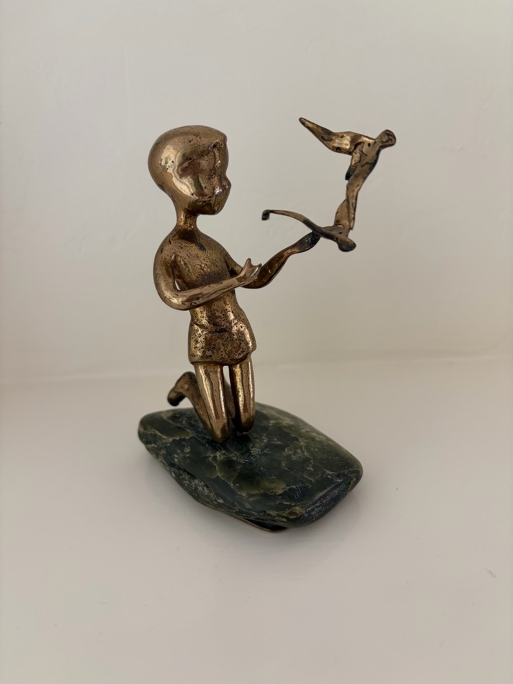 Vintage Malcom Moran bronze boy with birds on Jade rock. Gumps exclusive